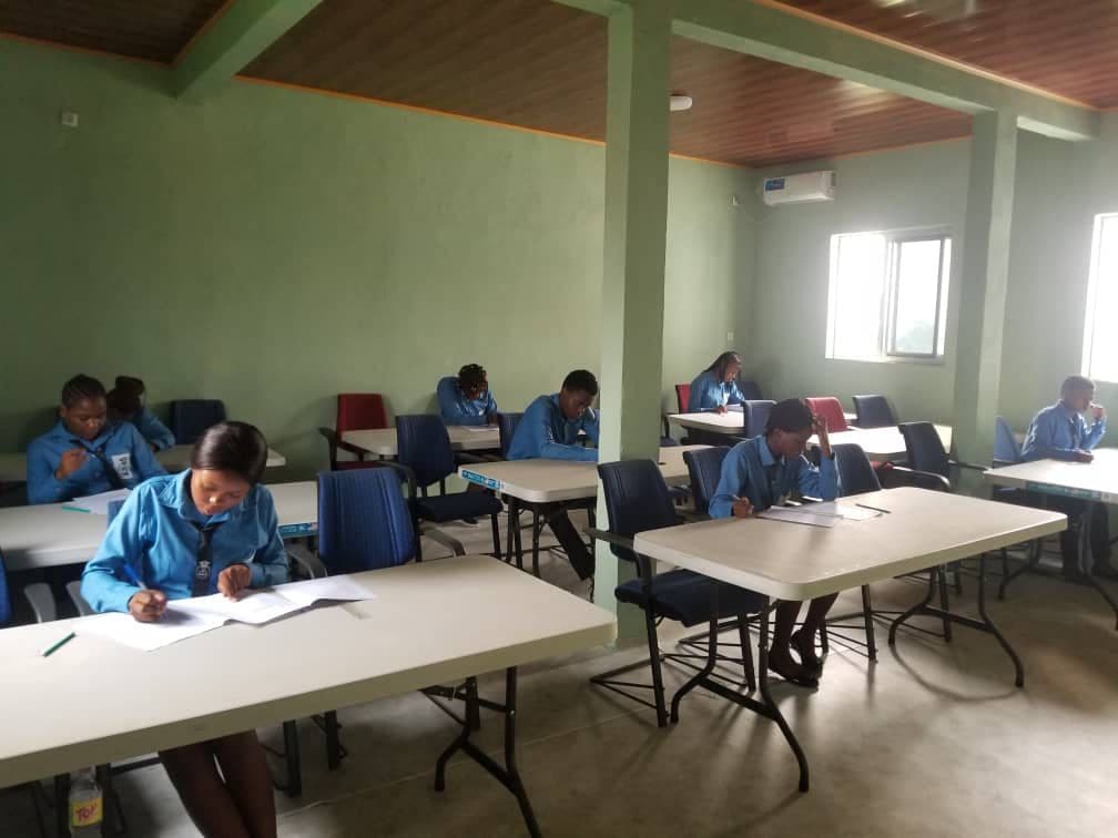 Students writing an exam in the lecture hall