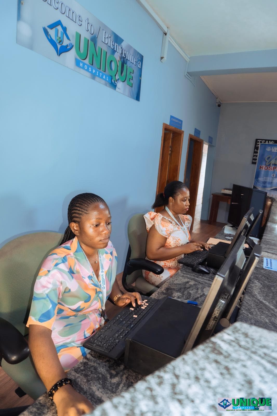 UBHI students at the Unique Hospital reception desk